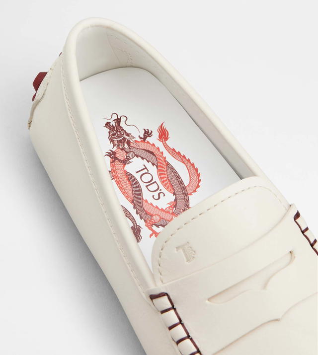 The dragon that wraps itself around the Tod's logo
