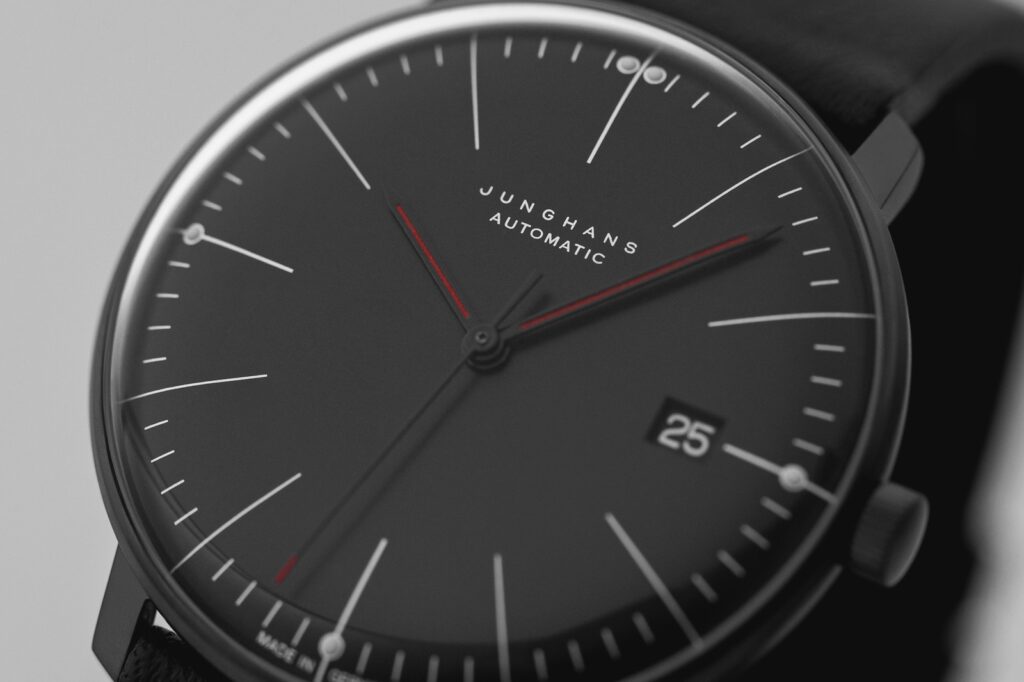 A close-up of the matte black dial featuring environmentally friendly luminous dots (Credit: Junghans)