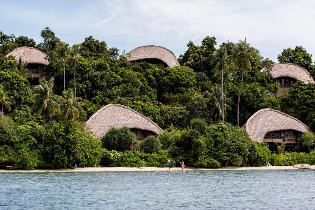 Crescent-shaped roofs made from local grass add symmetry to the surroundings (Credit: Cempedak Island)