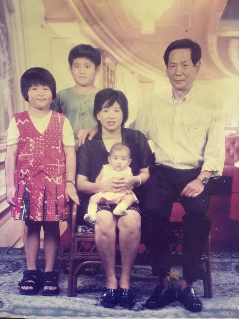 Chan as a baby, with her family