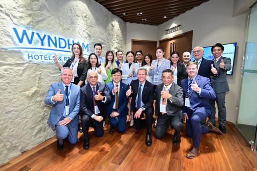 Wyndham Hotels and Resorts staff showing the thumbs up