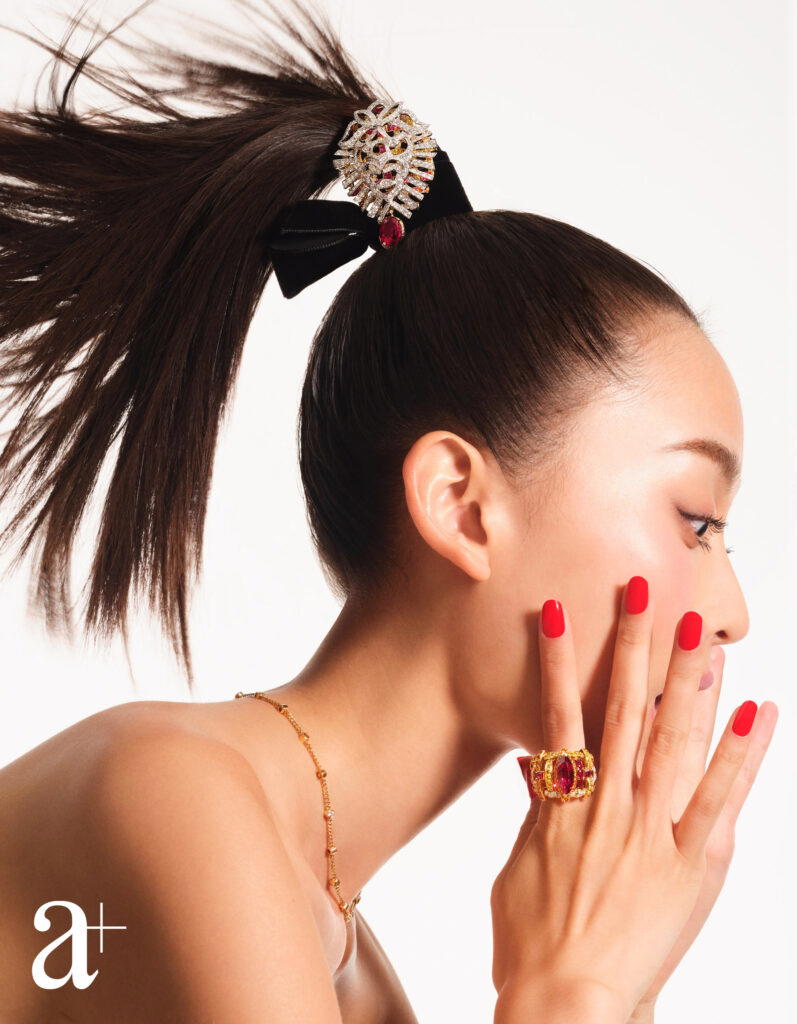 Tweed Lion brooch (part of a set with necklace) in white and yellow gold with diamonds, rubies, yellow sapphires, garnets, and one oval-cut 9.13-ct pinkish red spinel, and Tweed Lion ring in yellow gold with diamonds, rubies, yellow sapphires, and garnets, from Chanel (Credit: a+)