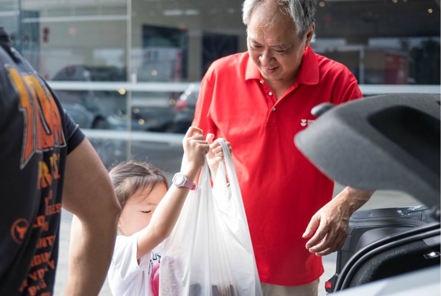 A Food from the Heart volunteer at its Heart on Wheels campaign