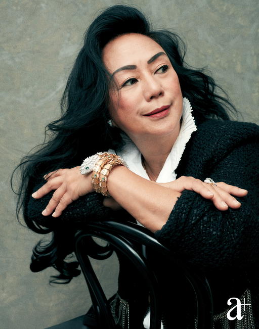 Chiang is wearing High Jewellery Serpenti earrings, bracelet, and ring, in yellow and white gold with emeralds and diamonds, all from Bulgari (Credit: Joel Low)