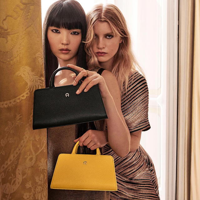 A closer look at the&nbsp;CYBILL Stretch handbag in black and tanned yellow