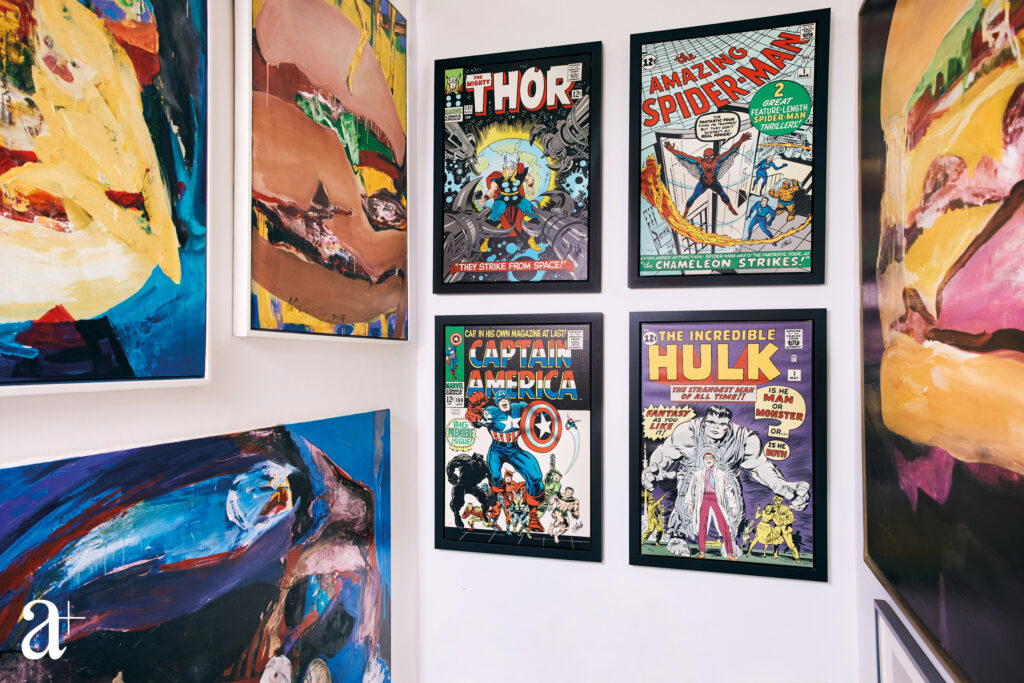 One of the walls in Paul and Lena Ng's home, filled with prints of old comic book covers