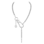 Sporty 5 necklace in white gold with diamonds.<br>This is a transformable piece composed of a<br>necklace and a pair of earrings. The two necklace<br>pendants are interchangeable and can also be<br>positioned on the hoop motif earring (Credit: Chanel)