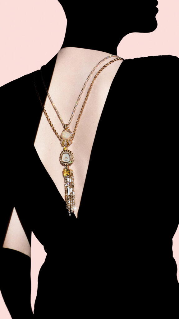 Transformable watch sautoir in yellow gold with diamonds, sapphires, and an opal