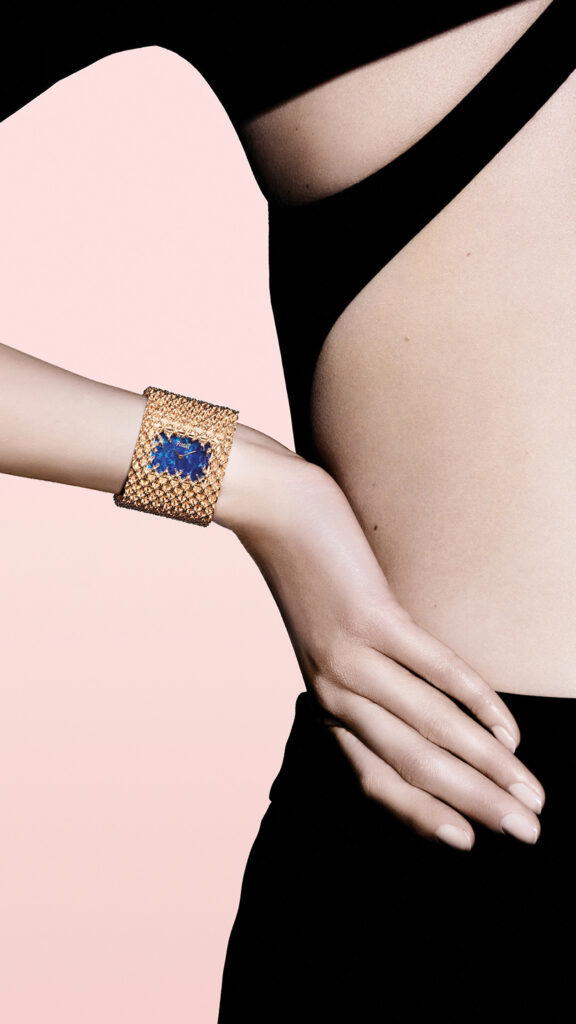 Cuff watch in pink gold with diamonds and an opal