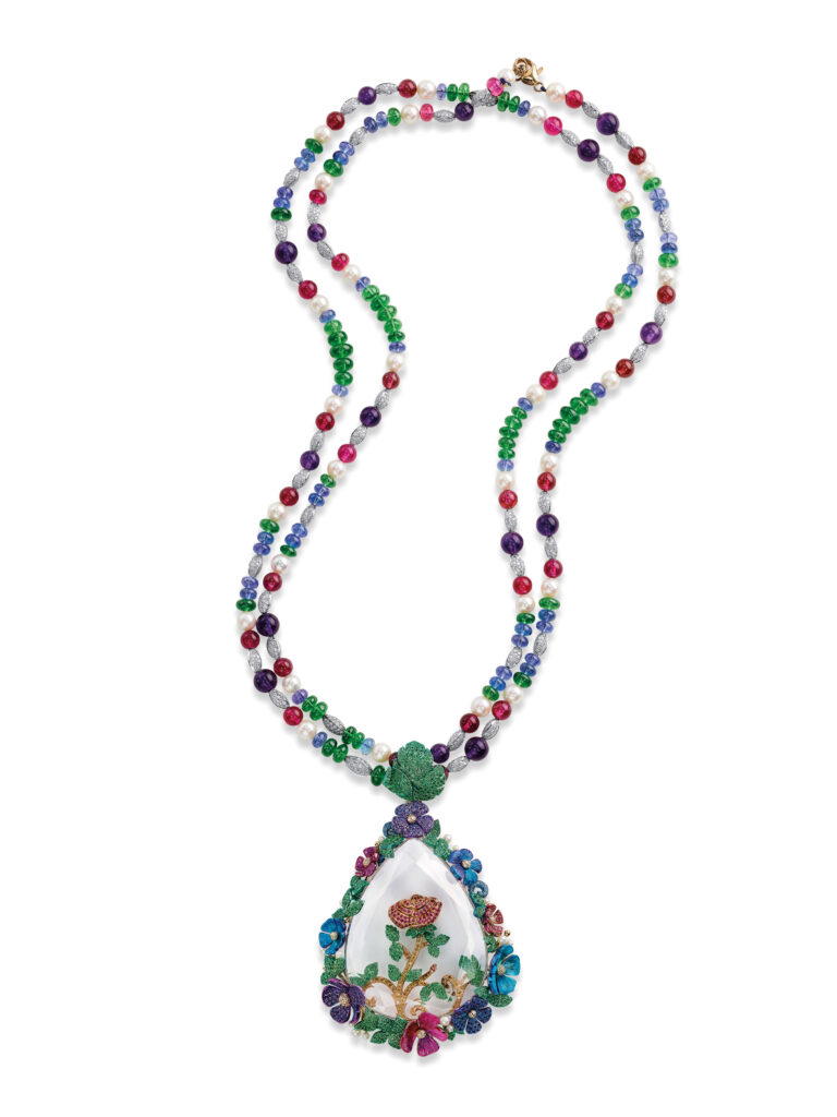 Pendant necklace in ethical rose gold and titanium with a 88.96-ct rock crystal, sapphires, rubies, diamonds, amethysts, tsavorites, pearls, and rubellites