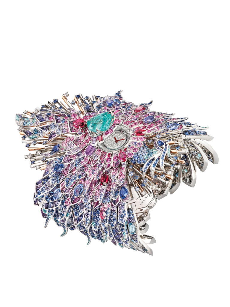 The Fenice High-Jewelry Watch reveals an exceptionally rare central 9.78-ct Paraiba tourmaline that hides the dial