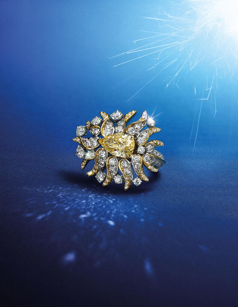 Flames ring in platinum and yellow gold with diamonds