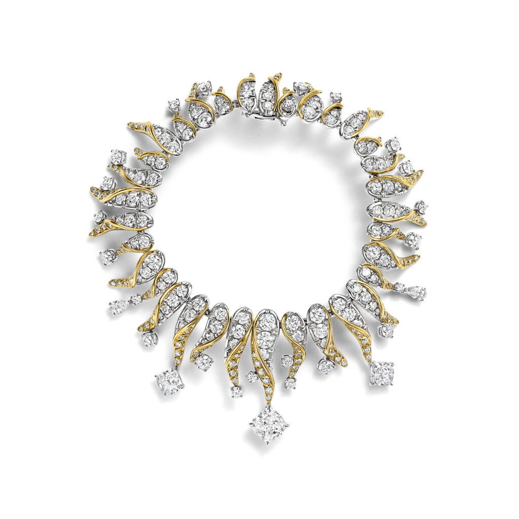 Flames bracelet and earrings in platinum and yellow gold with diamonds