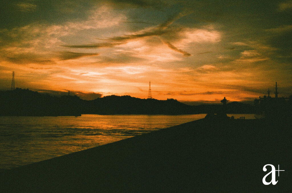 Miyanoura port in Naoshima, serviced by regular ferries and high-speed boats from Kagoshima and Tanegashima, offers stunning views of the Pacific Ocean at sunset