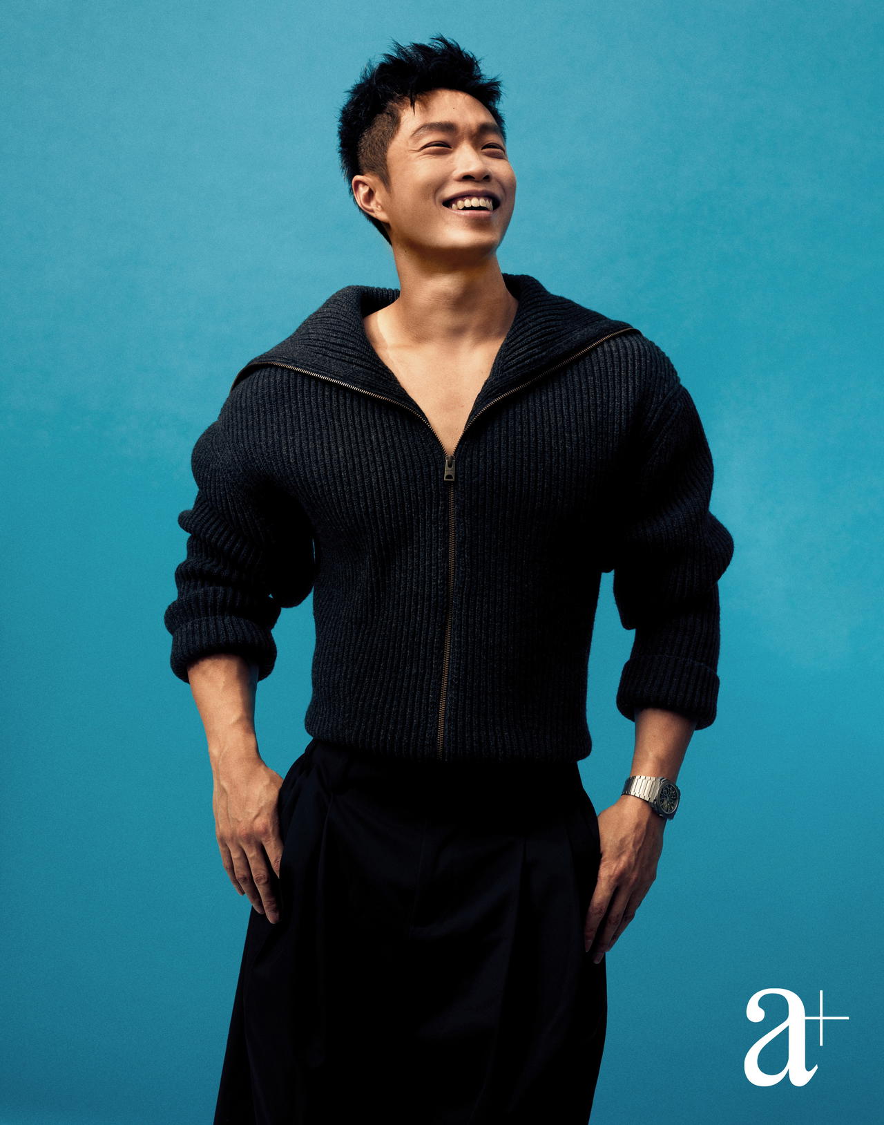 Octo Finissimo Skeleton 8 Days in titanium from Bvlgari; wool knit sweater from Onitsuka Tiger; and wool blend trousers from Kenzo