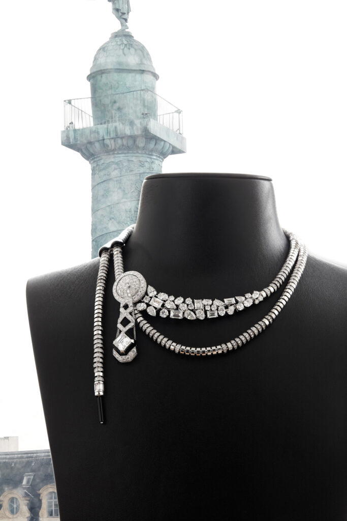 Gold Slider necklace in white gold with diamonds, onyx, and black lacquer