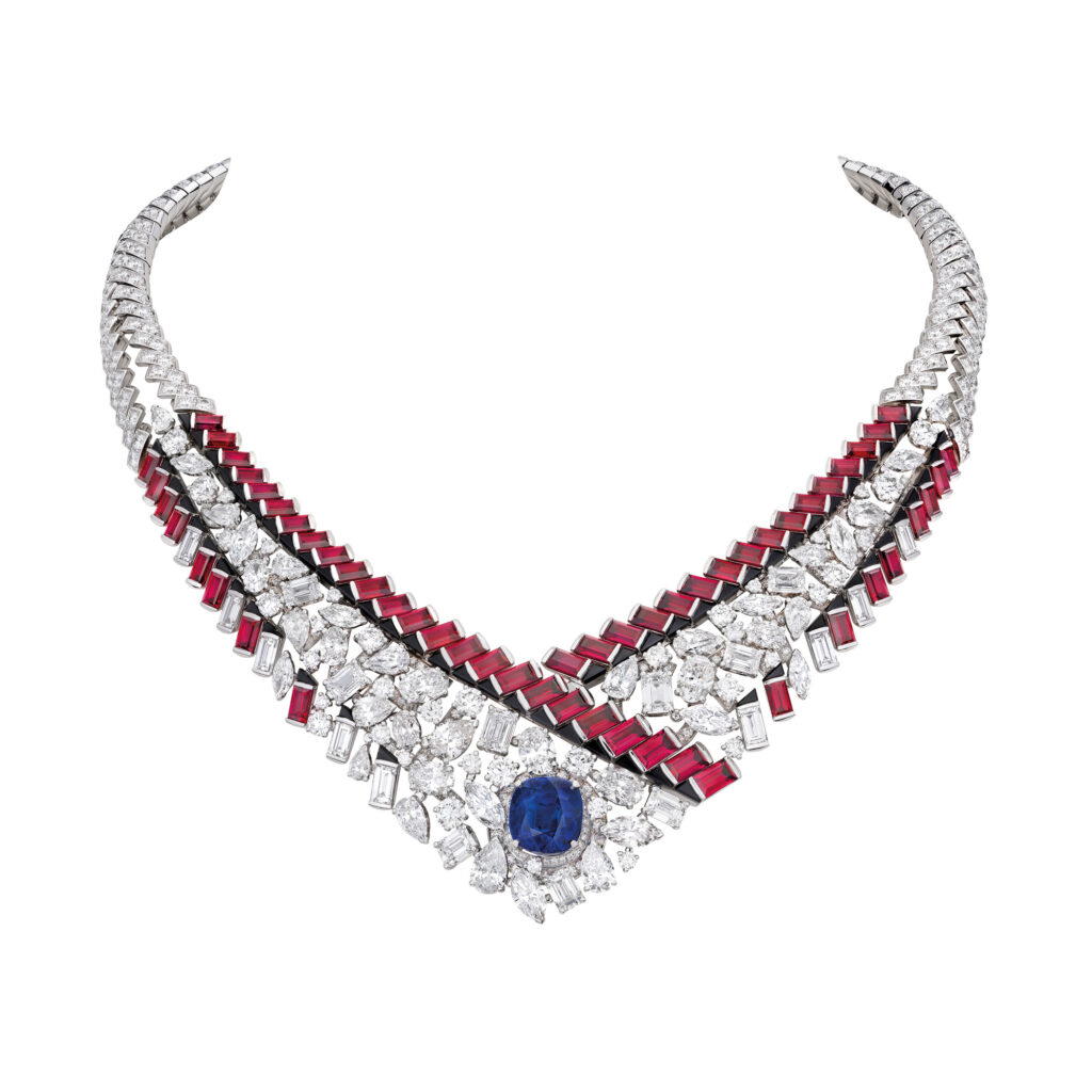 Graphic Line necklace in white gold and platinum with diamonds, rubies, onyx, and 10.15-ct Kashmir sapphire