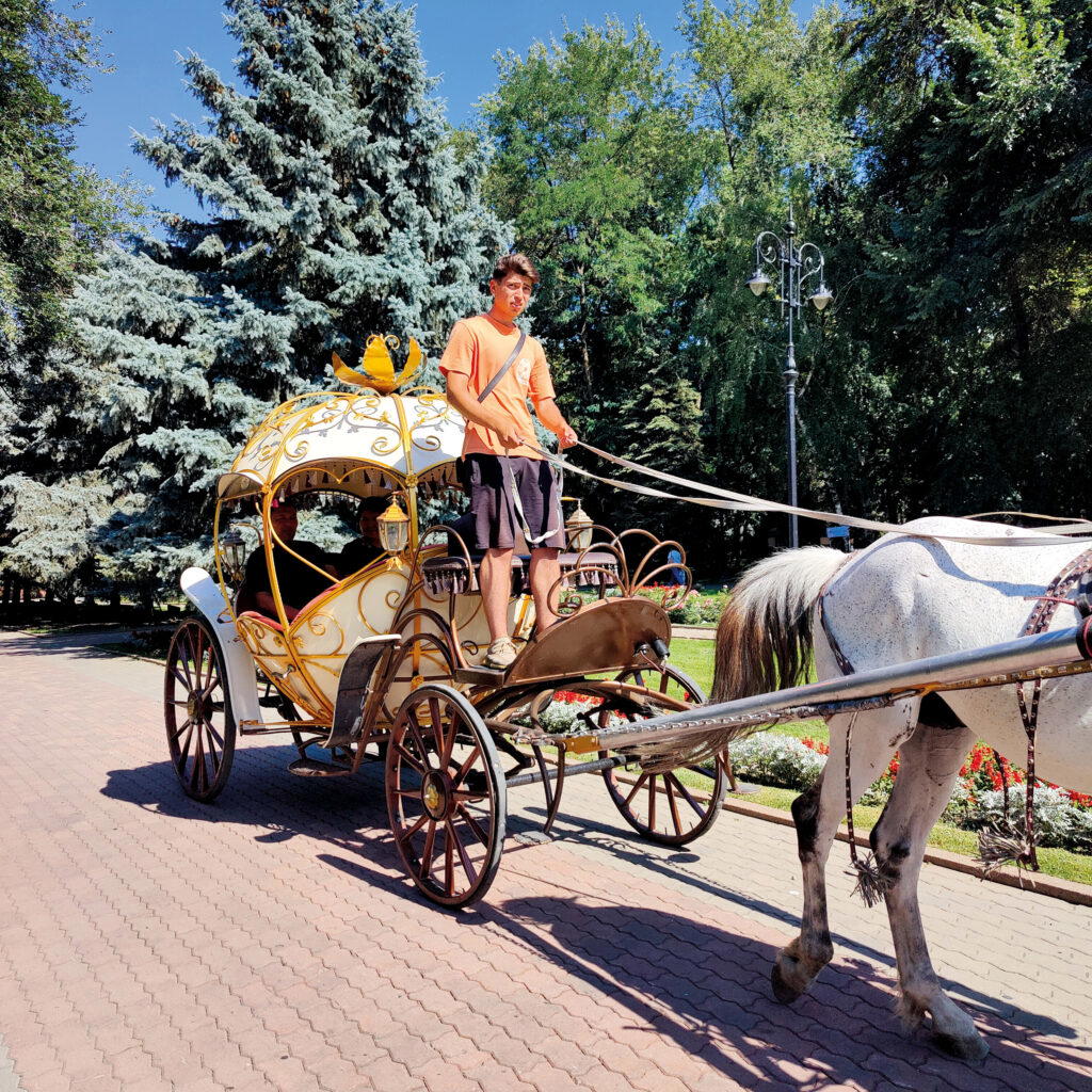 A horse-driven carriage in Panfilov Park