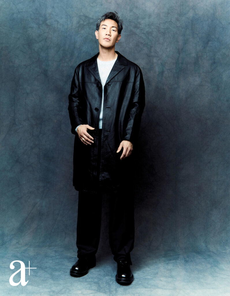 Wool sweater,&nbsp;trousers, calfskin coat, and derby shoes, all from Prada