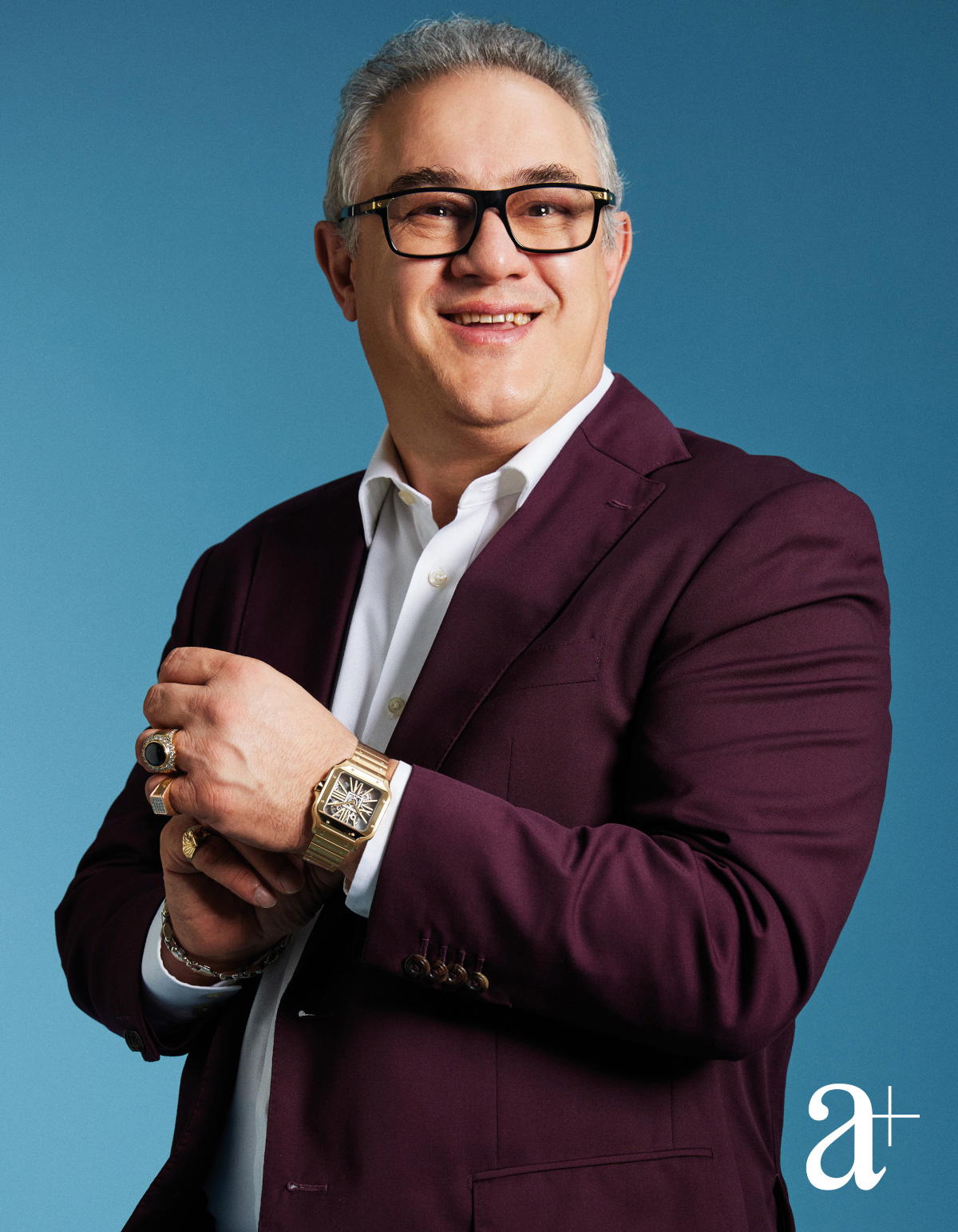 Dr Farshad Shishehchian is wearing the Santos de Cartier Skeleton (large model) in yellow gold (Credit: Mun Kong. )