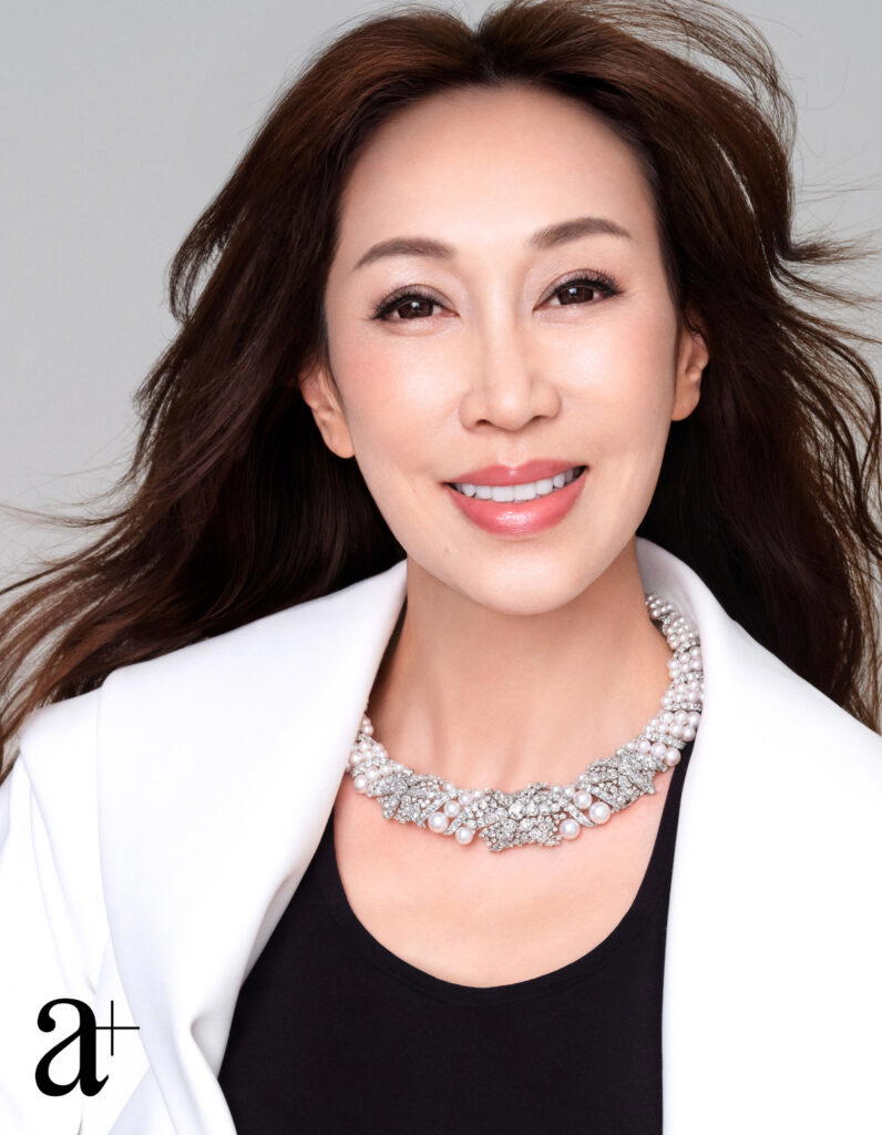 Starfish Necklace in platinum with pearls and diamonds, from Tiffany & Co. Tank top and jacket, Grace’s own