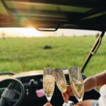 At Finniss River Lodge, guests sip champagne while getting up close to cattle during Cows and Canapes. Photo: Samantha Francis