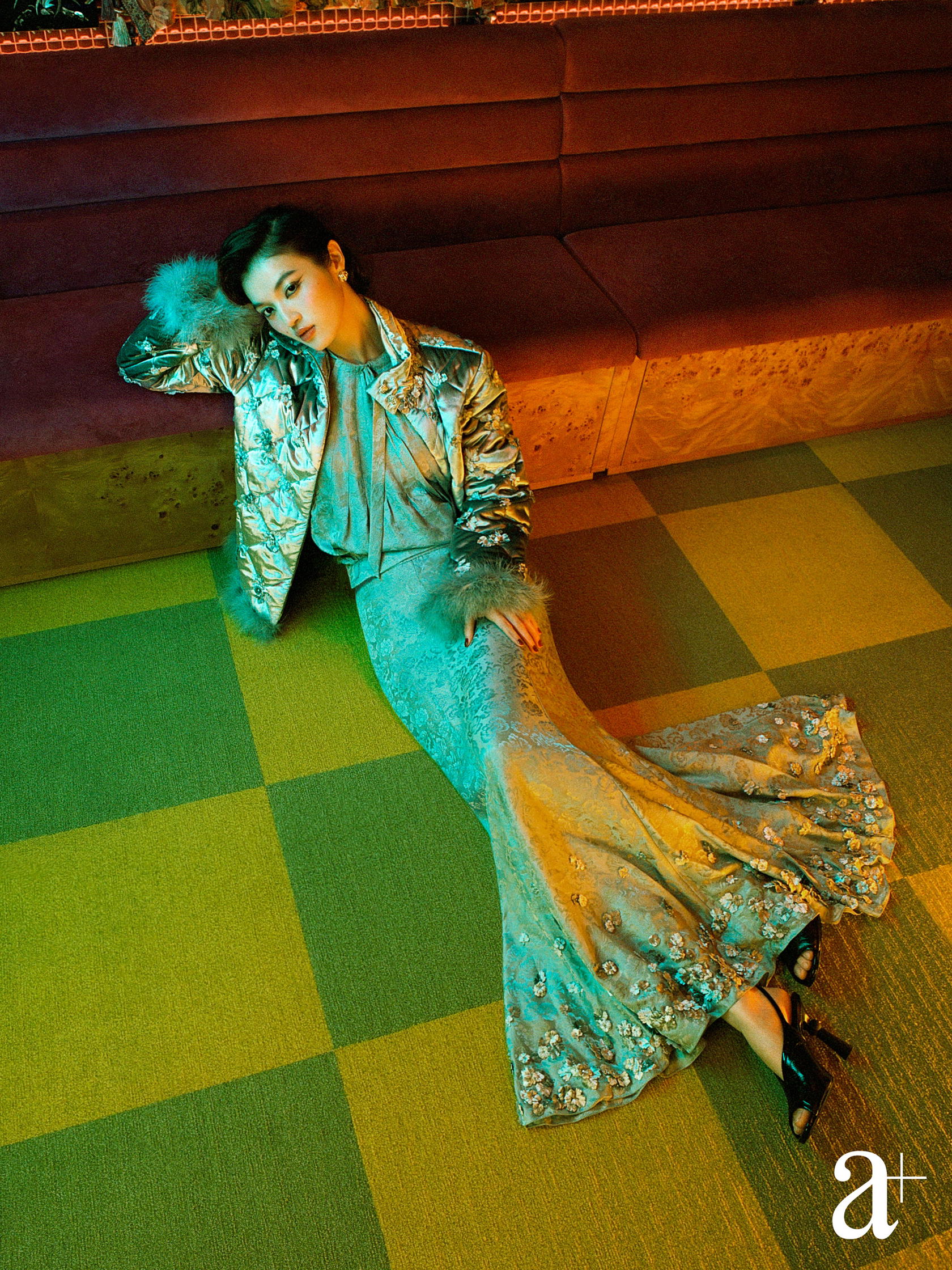 Quilted silk velvet jacket with feathers and velvet flowers, silk jacquard top, embroidered silk jacquard skirt, metal and strass earrings, and patent leather heeled sandals, from Chanel (Photography Stefan Khoo)