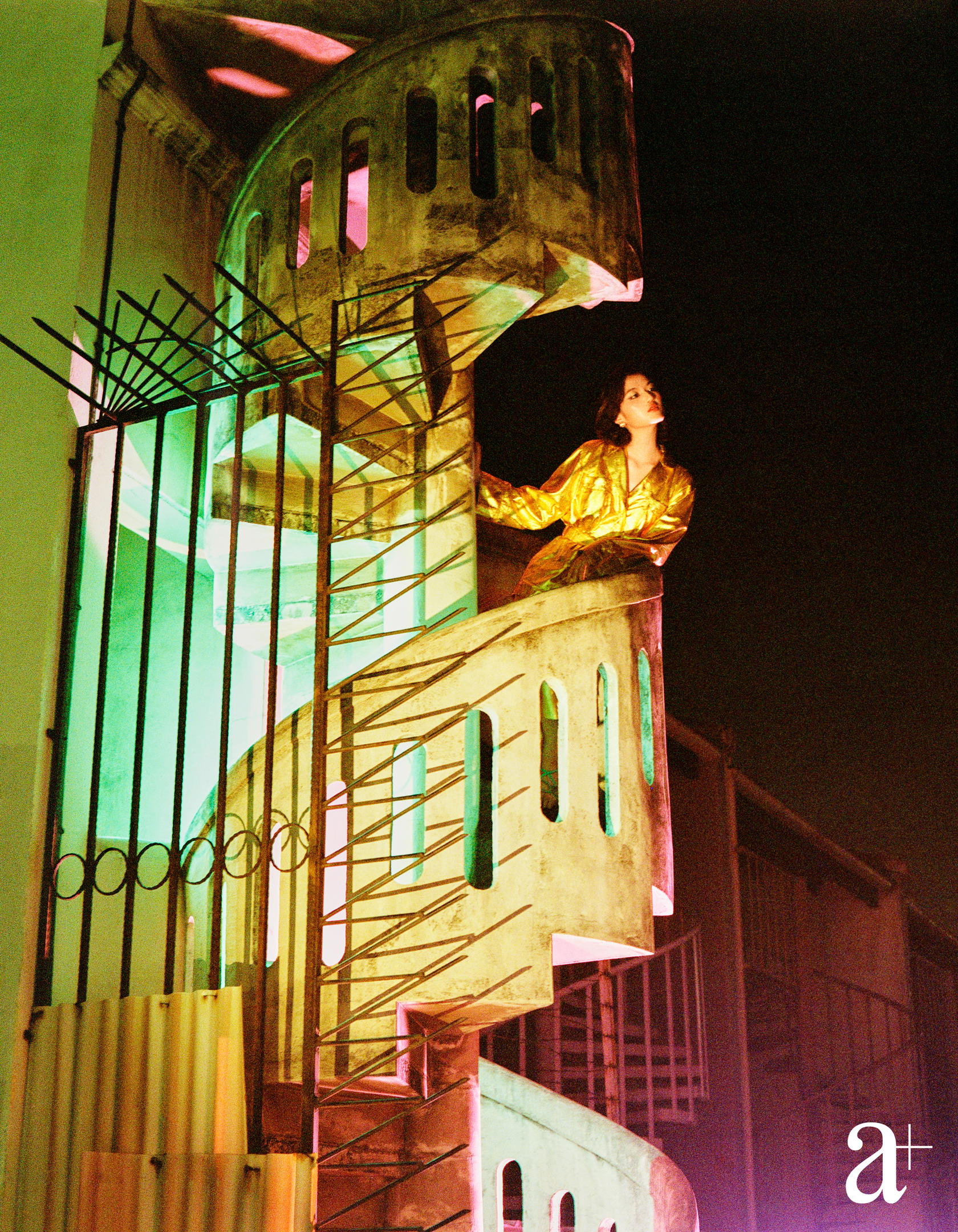 Embellished crumpled calfskin jacket with jewelled buttons and matching trousers, and metal and strass earrings, from Chanel (Photography: Stefan Khoo)