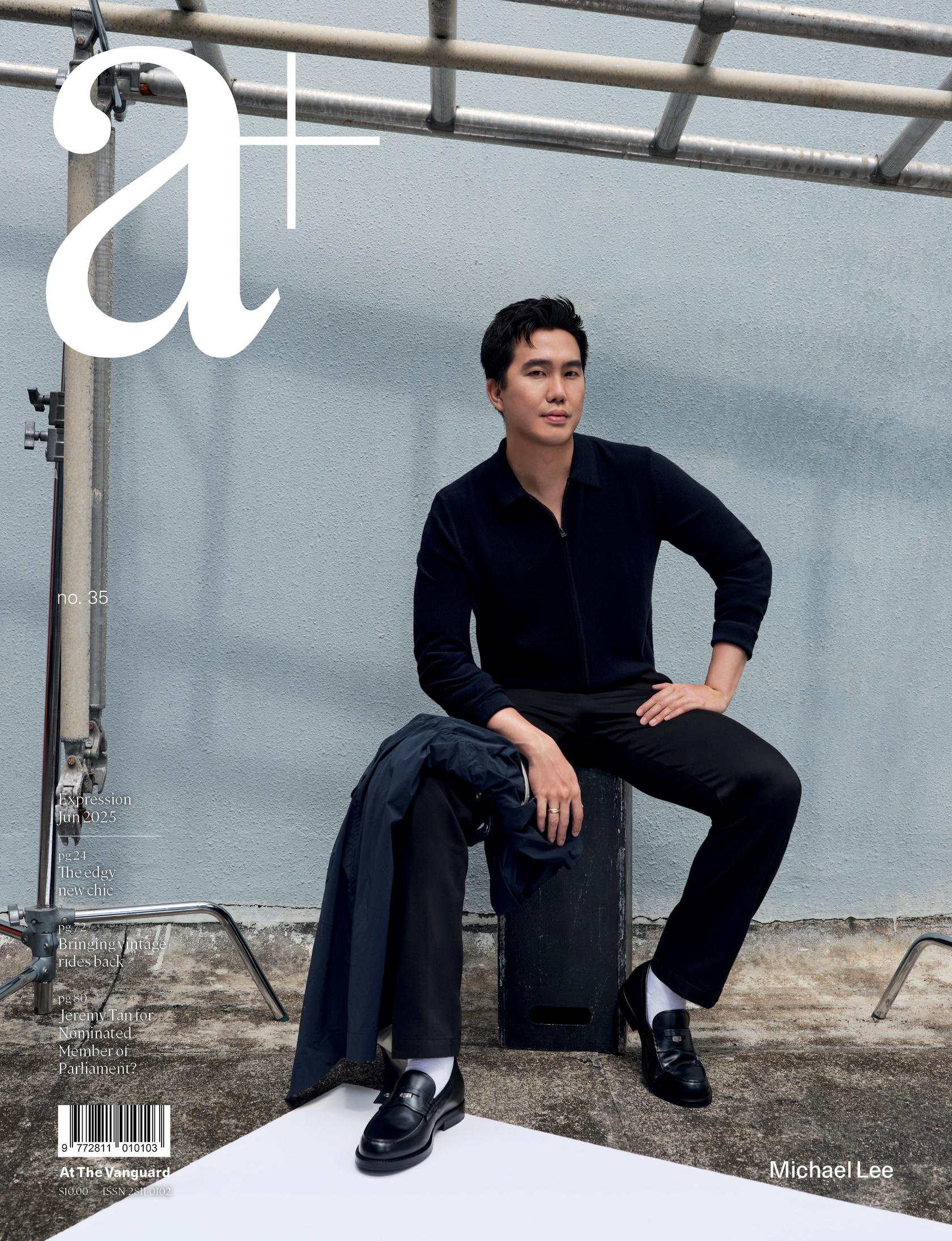 Wool knit full zip-up polo neck cardigan, wool trousers, and calfskin loafers, all from Boss. Polyester blend trench (on knee), from Brunello Cucinelli