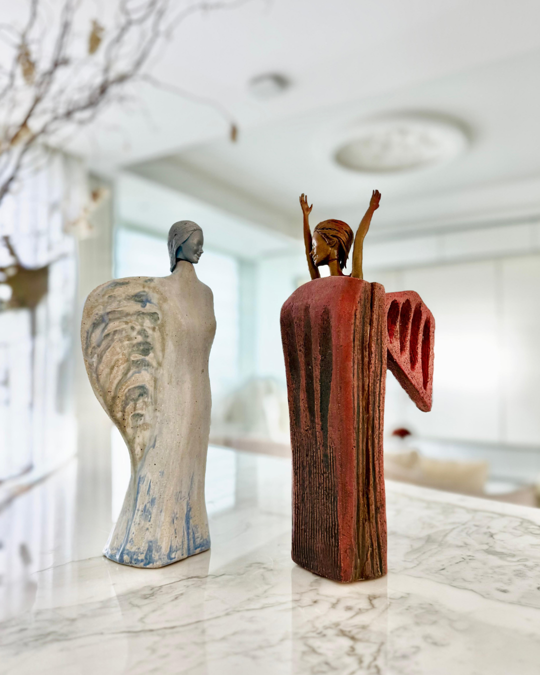 ‘She Wants To Fly’ (left), and ‘She is Flying!’ (right), by Singapore-based ceramic artist, Delia Prvacki (Credit: Eunice Yeo)