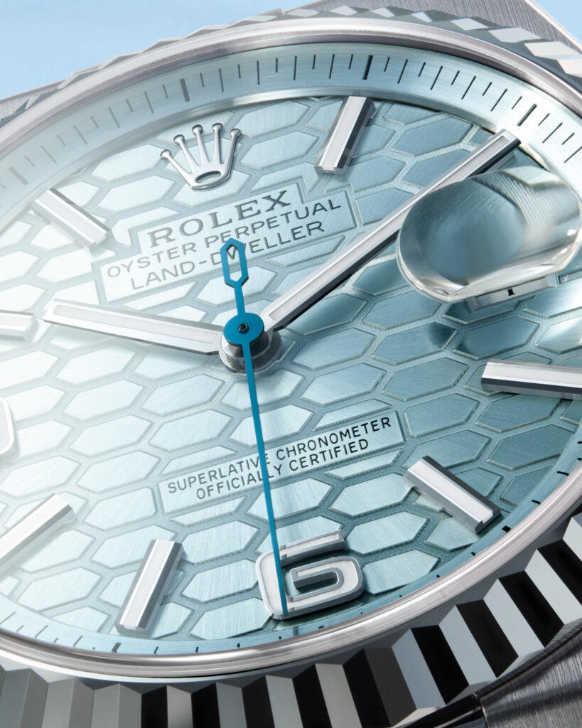 Its exquisite honeycomb-motif dial features stylised hexagonal cells created with femtosecond laser technlogy (Credit: Rolex)
