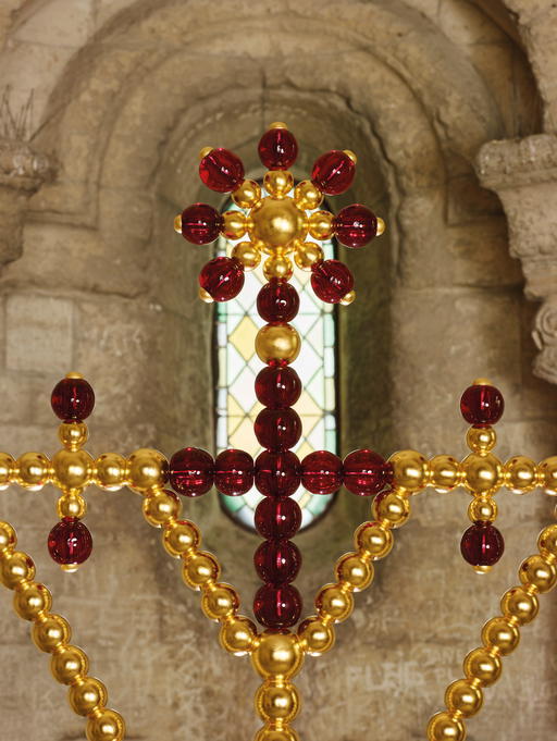 One of Jean-Michel Othoniel’s golden metal and red glass bead crosses on the Pont d’Avignon (Credit: Jean-Michel Othoniel)