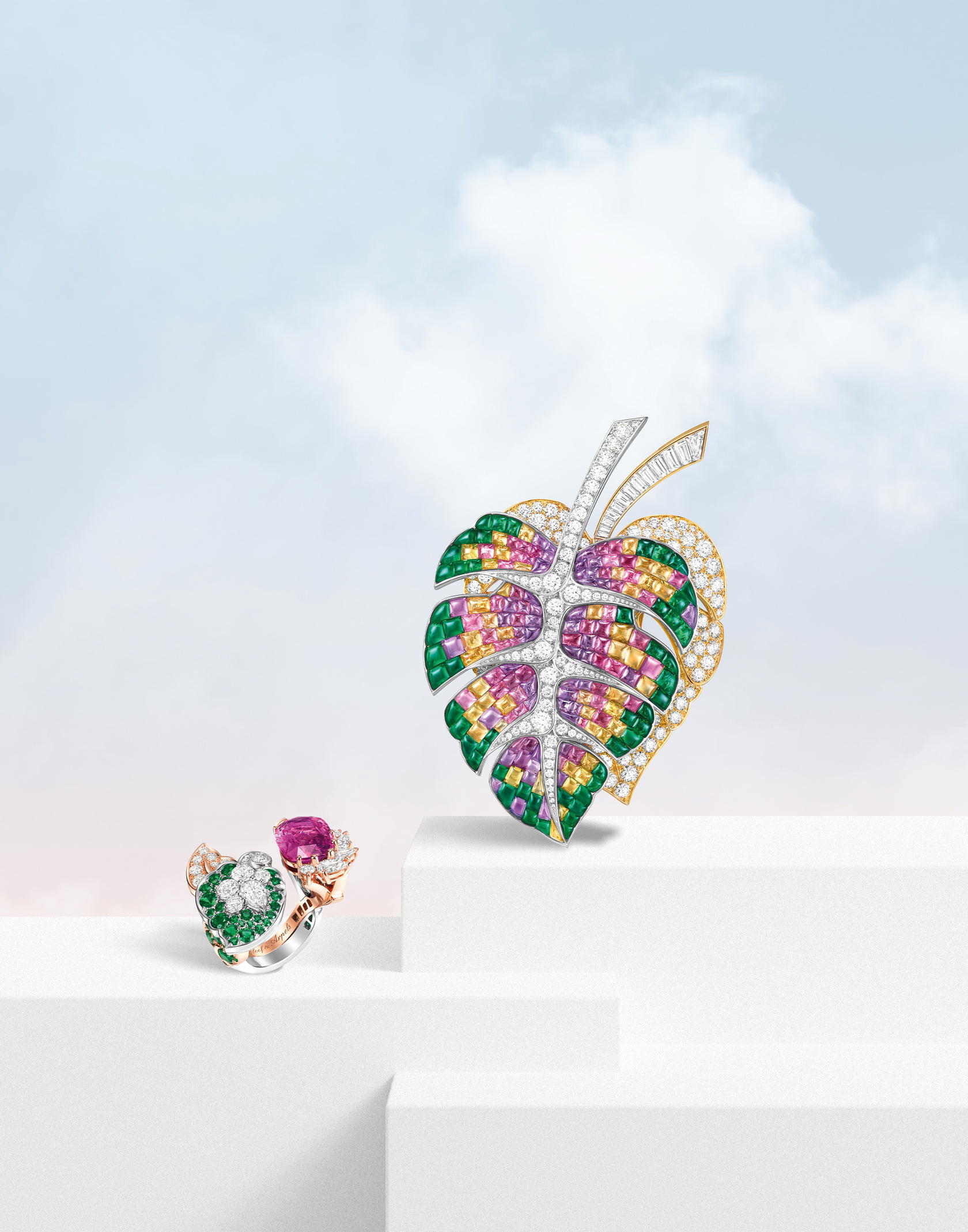 The Mysterieux clip showcases Van Cleef & Arpel’s signature Vitrail Mystery Set technique, while a Jungle Flower ring captures the lushness of tropical vegetation (Credit: Van Cleef & Arpels)