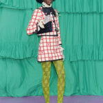 Polished suit skirts, crisply tailored blazers, structured bags, and a quiet confidence are the hallmarks of this new era (Credit: Valentino)