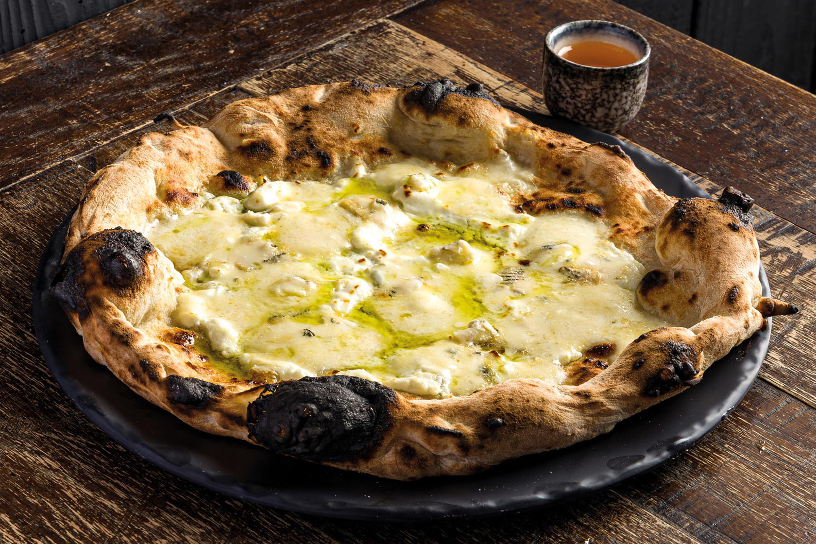 5 Formaggi pizza (Credit: Pizza Studio Tamaki)