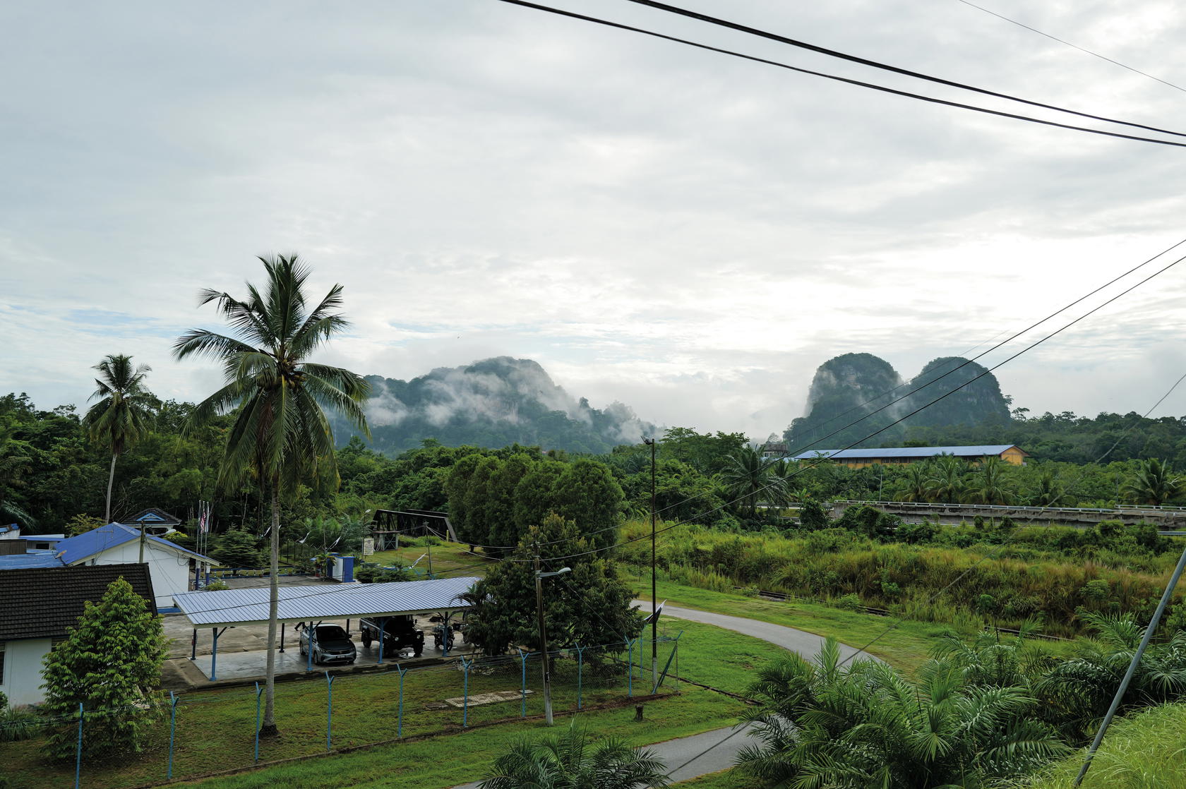 Arriving at Merapoh Train Station, we were greeted by fog and limestone hills (Credit: Chia Wei Choong)