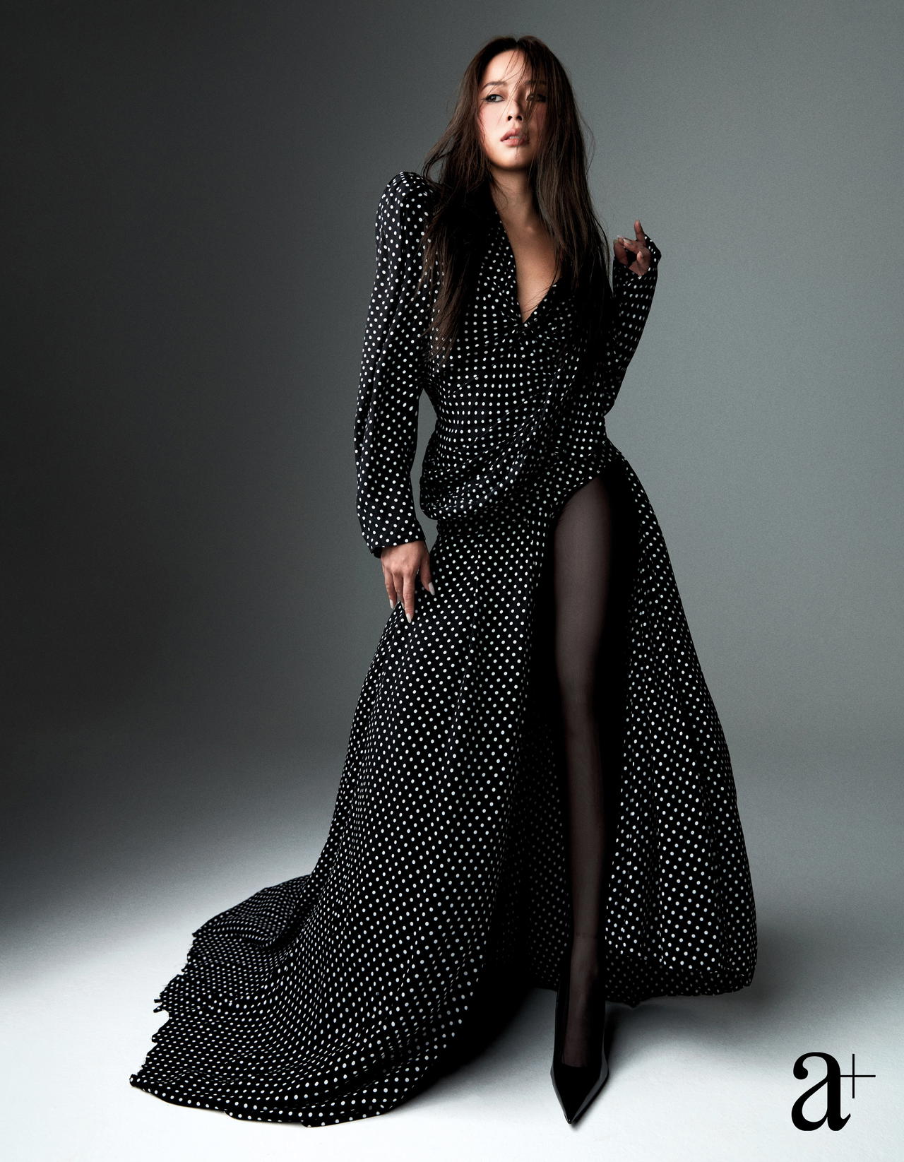 Viscose dress, polyester tights, and calfskin heels, all from Balenciaga (Credit: Joel Low. )