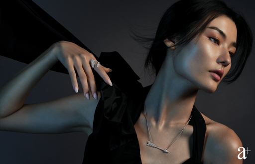 Flèche Pendant in white gold with diamonds, and Flèche Ring in white gold with diamonds, both from Boucheron.&nbsp; Wool Jumpsuit, from Max Mara (Credit: Stefan Khoo )