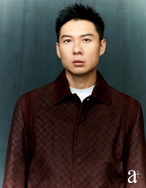 Cotton shirt, wool sweater and wool trousers, all from Prada (Credit: Joel Low. )