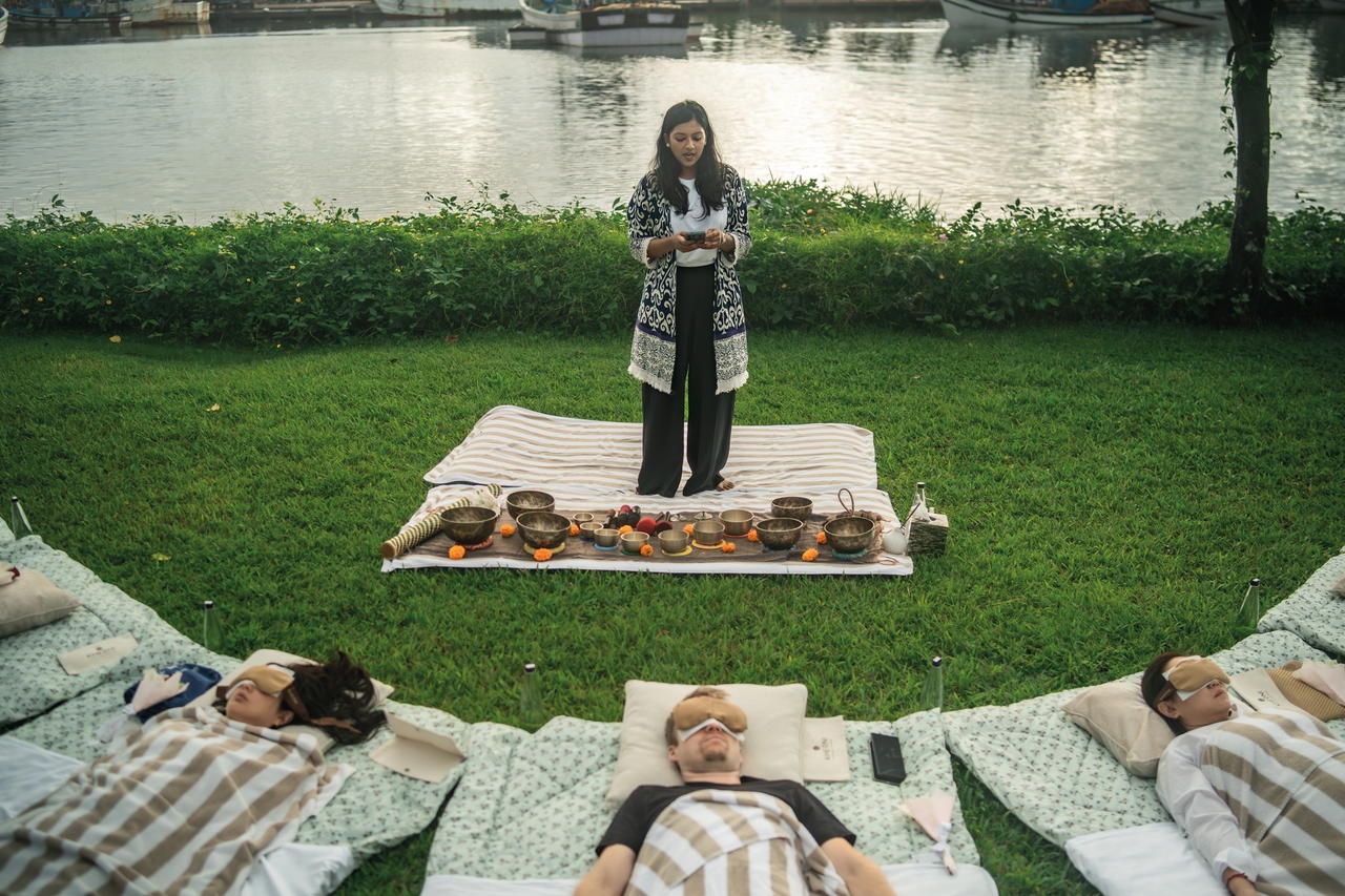An outdoor sound bath by the river (Credit: The St. Regis Goa Resort)