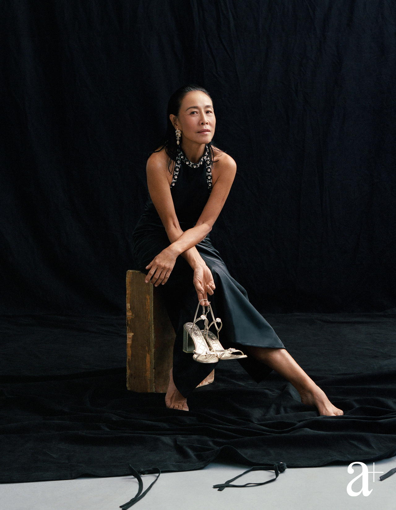 Embellished lambskin dress, metal and strass earrings, and lambskin slingbacks, all from Chanel (Credit: Stefan Khoo. )