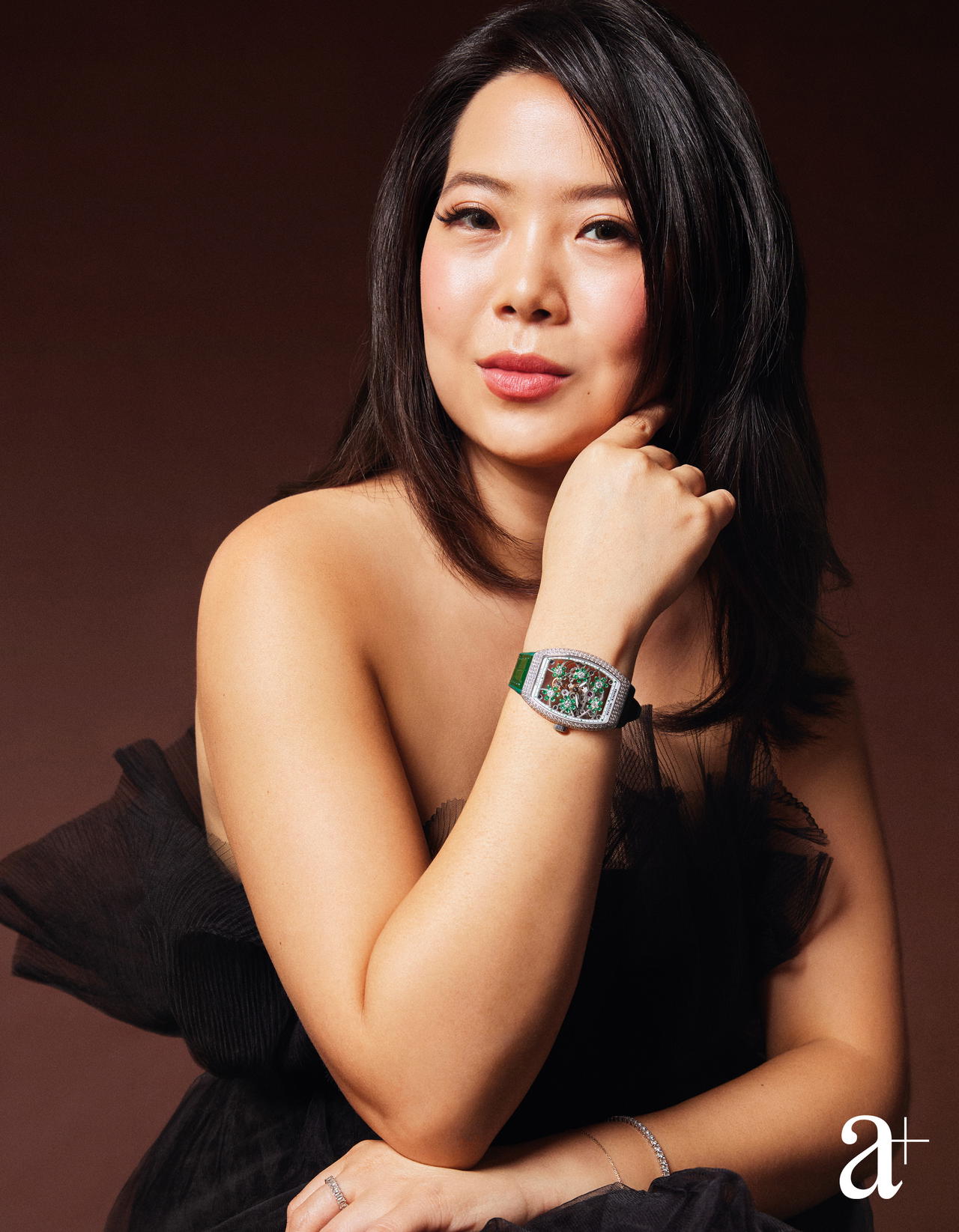 Foo wears the Franck Muller Vanguard Curvex Cut Flower in white gold with diamonds and emeralds, from Cortina Watch (Credit: Mun Kong. )