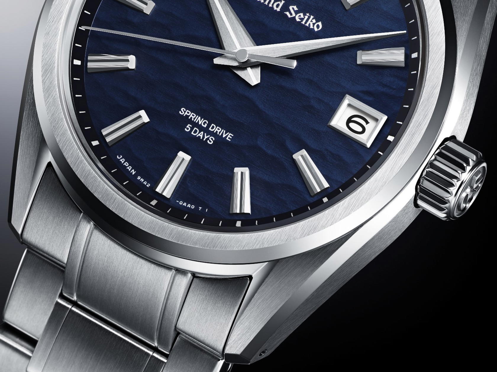 The dial evokes the ripples that glide across the surface of Lake Suwa before dawn, with a deep blue that changes under light (Credit: Grand Seiko)