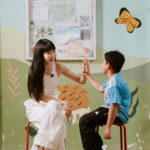 Eunice Yeo, founder of Peace of Art, with a beneficiary (Credit: 60 Lights, One Future)