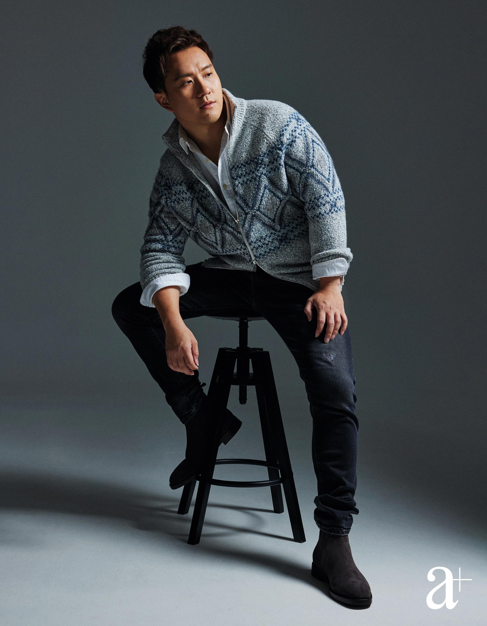 Cotton shirt and distressed jeans, both from Polo Ralph Lauren. Wool and silk sweater and suede boots, both from Brunello Cucinelli (Credit: Mun Kong)