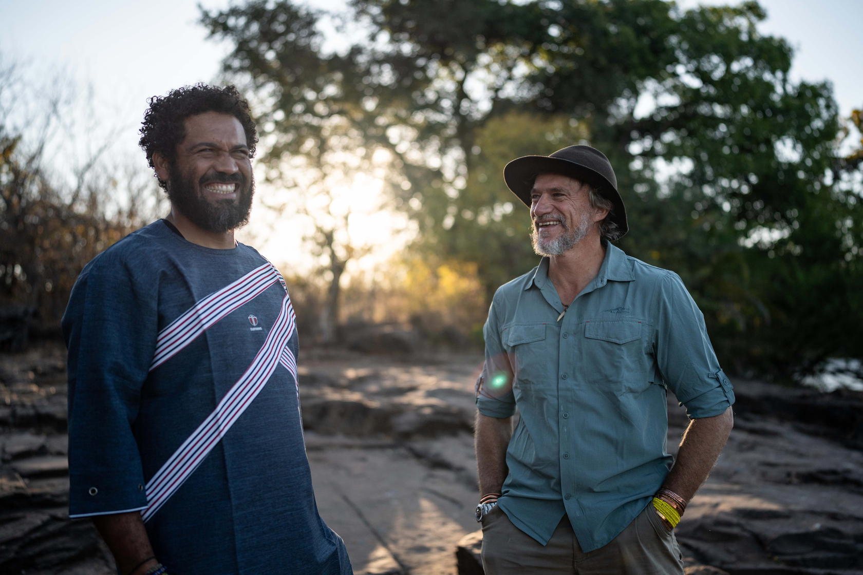 On the banks of the Zambezi River in Victoria Falls, Boyes and expedition partner Kerllen Costa discuss their project supported by the Rolex Perpetual Planet Initiative. They launched the Great Spine of Africa expedition series in 2022 (Credit: The Wilderness Project/James Kydd)