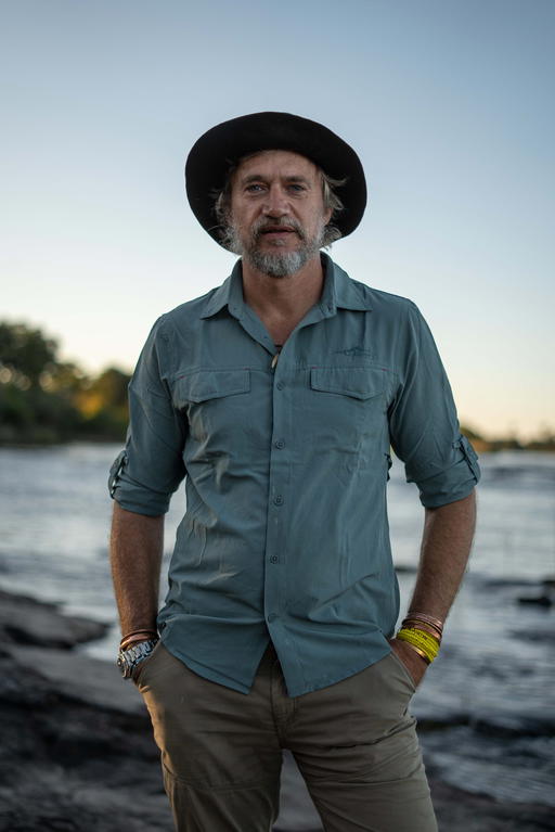 Boyes standing on the banks of the Zambezi River by Victoria Falls, Zimbabwe. For the Great Spine of Africa team, presenting at the 2025 Ramsar Convention was a major accomplishment. It demonstrated the tremendous effort over the past decade (Credit: Rolex/Aurélie Marrier d’Unienville)