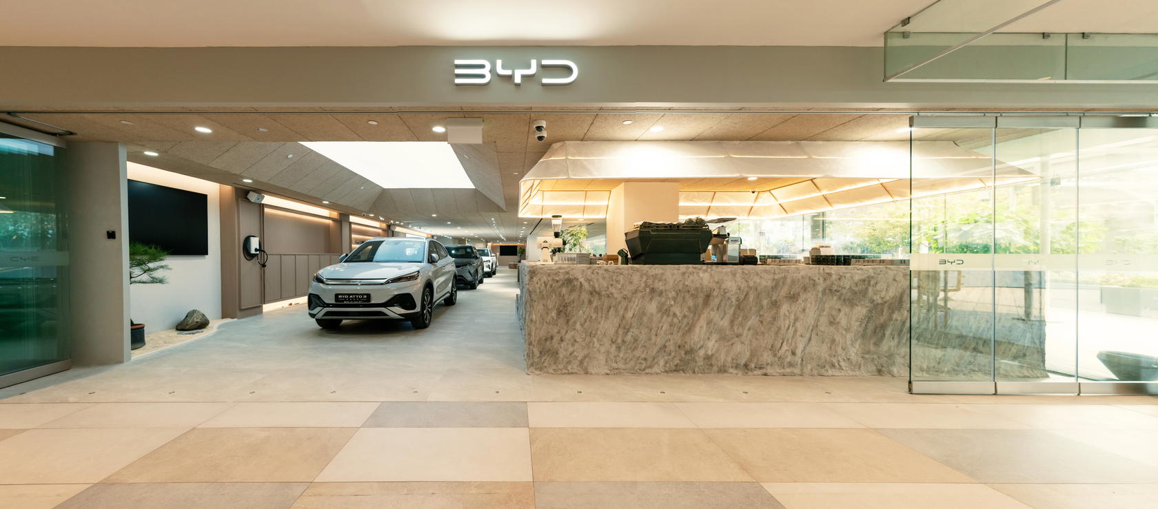 The sleek storefront of BYD By 1826 at IMM
