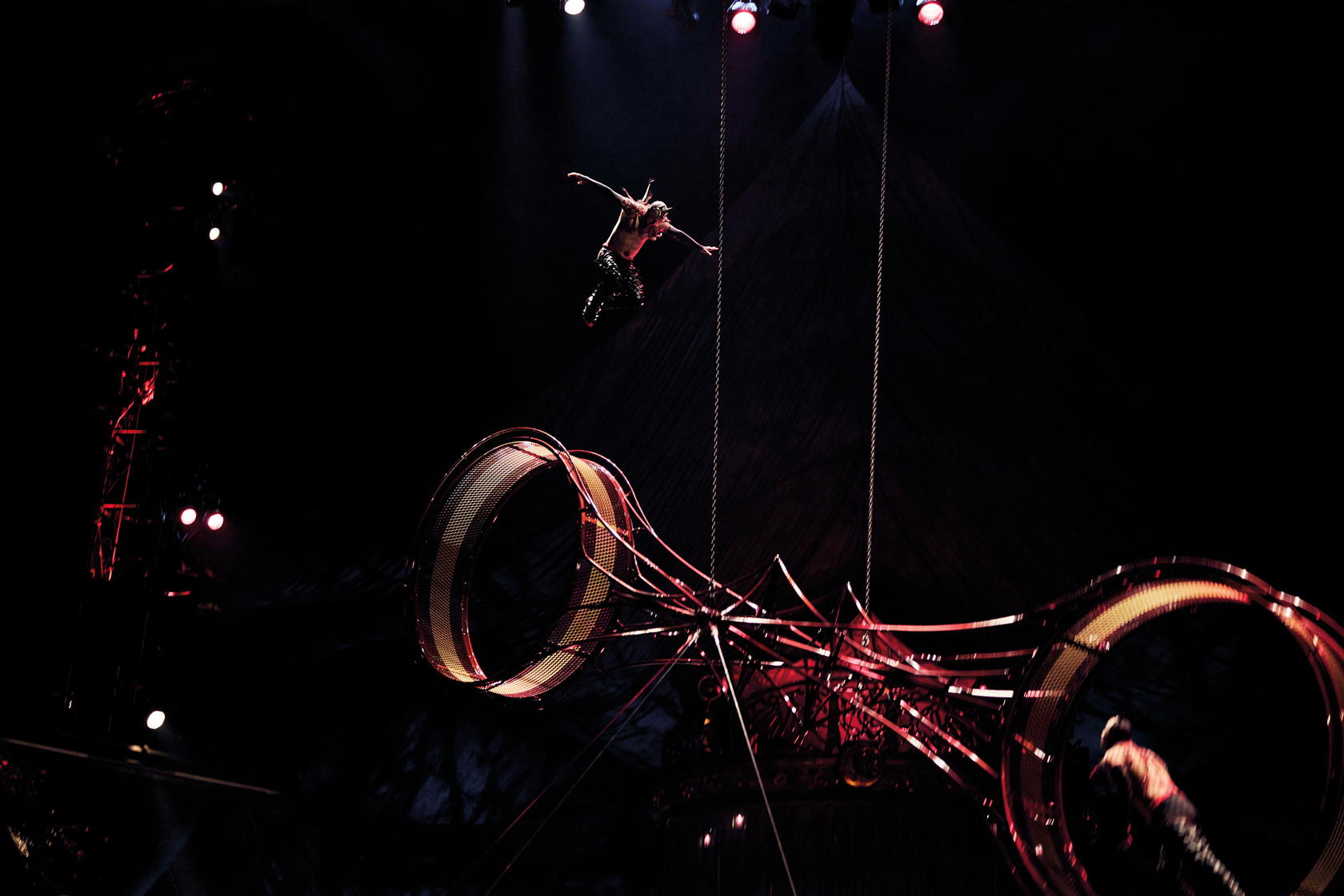Two acrobats dart in and out of a 725-kg apparatus as it spins at dizzying speeds in ‘Wheel of Death’ (Credit: Cirque du Soleil)