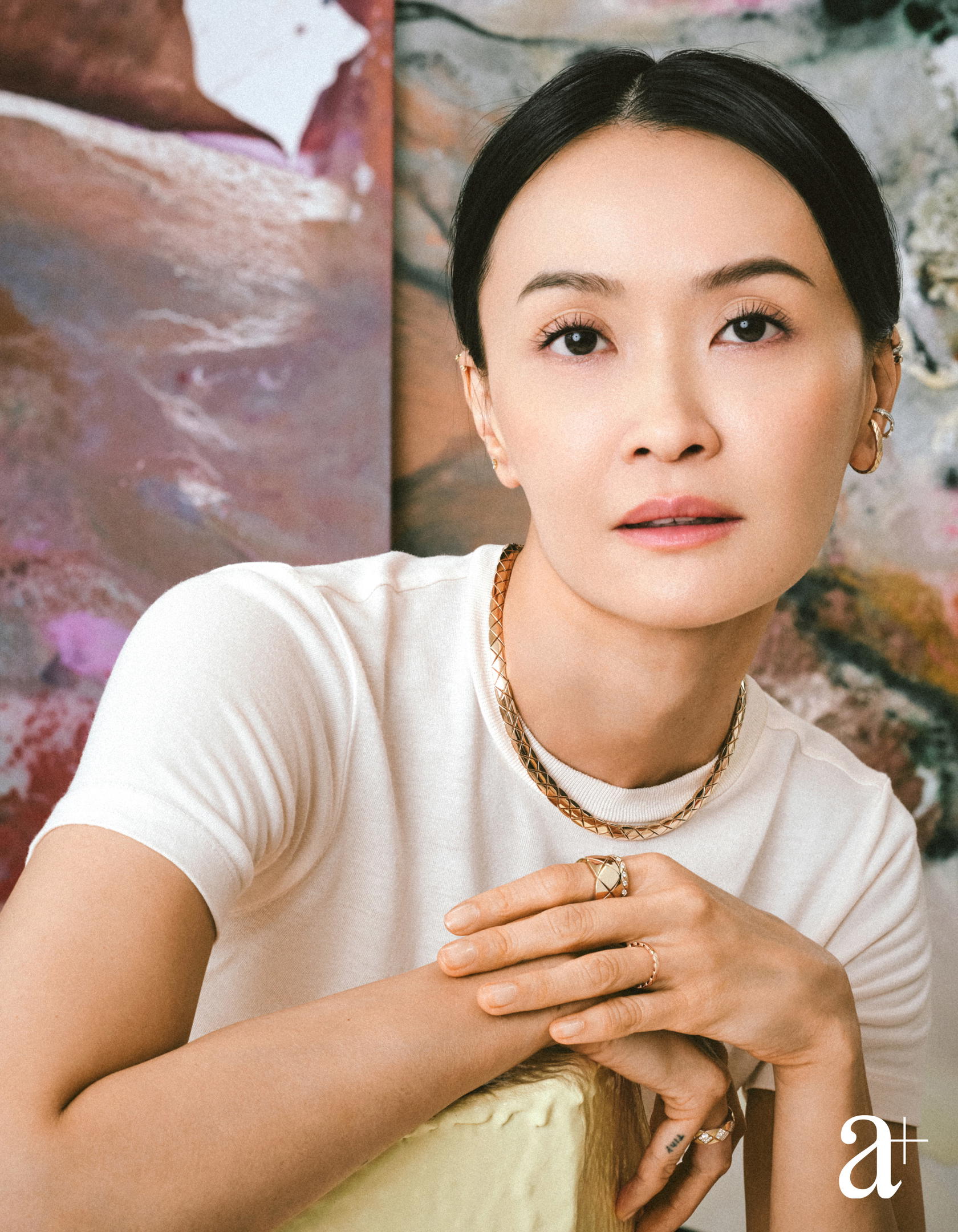 Coco Crush ear cuff in beige and white gold with diamonds, Coco Crush supple necklace in beige gold, and Coco Crush rings in biege gold with and without diamonds all from Chanel. T-shirt, Ng’s own (Credit: Stefan Khoo)